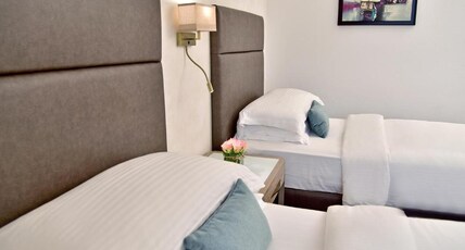 Gefinor Rotana Room Type - Guest Room - Twin Beds