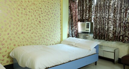 Ellora Guest House Room Type - Deluxe AC Room