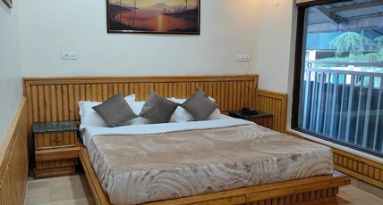 Greenwoods Inn Mcleodganj Room Type - Super Deluxe Family Suite ( AC Room ) Greenwoods Inn Mcleodganj Room Type - Super Deluxe Family Suite ( AC Room )