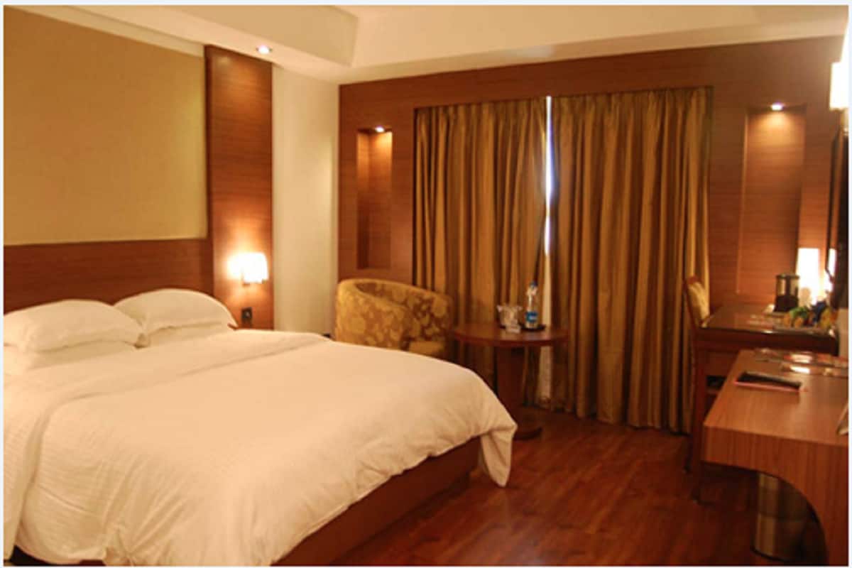 Hotel Anand Regency - Tap to explore photos