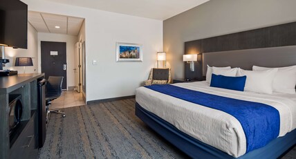 Best Western Plus Roland Inn & Suites Room Type - Accessible - Suite King Bed, Mobility Accessible, Roll In Shower, Sofabed, Non-Smoking, Full Breakfa