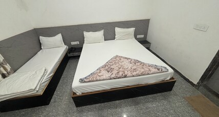 Hotel Ishwar Palace Room Type - AC Triple Bed Room With Window( 1 Double + 1 Single Bed)