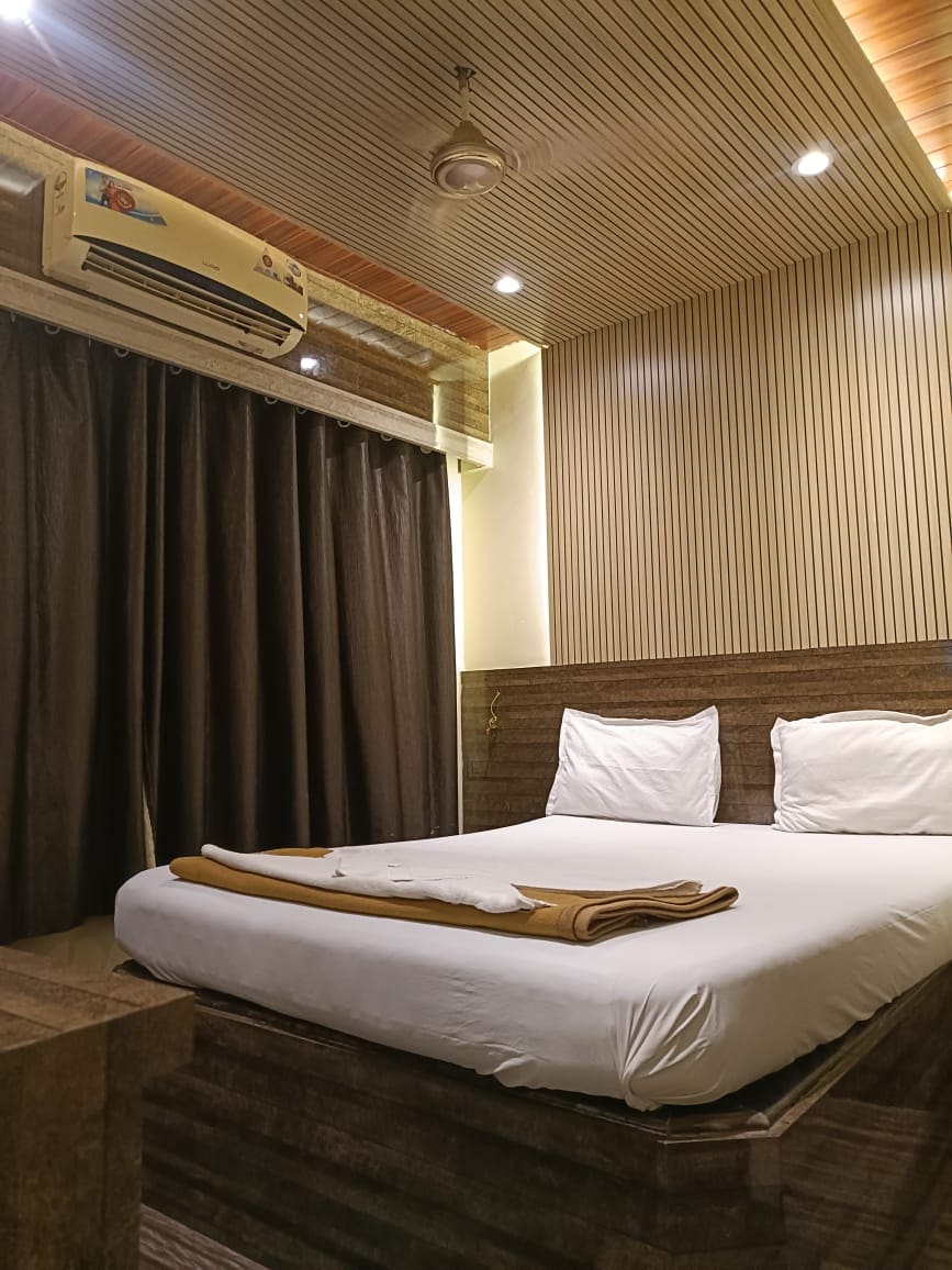 Om Sai Guest House - Tap to explore photos