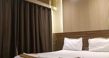Om Sai Guest House Room Type - Bedroom