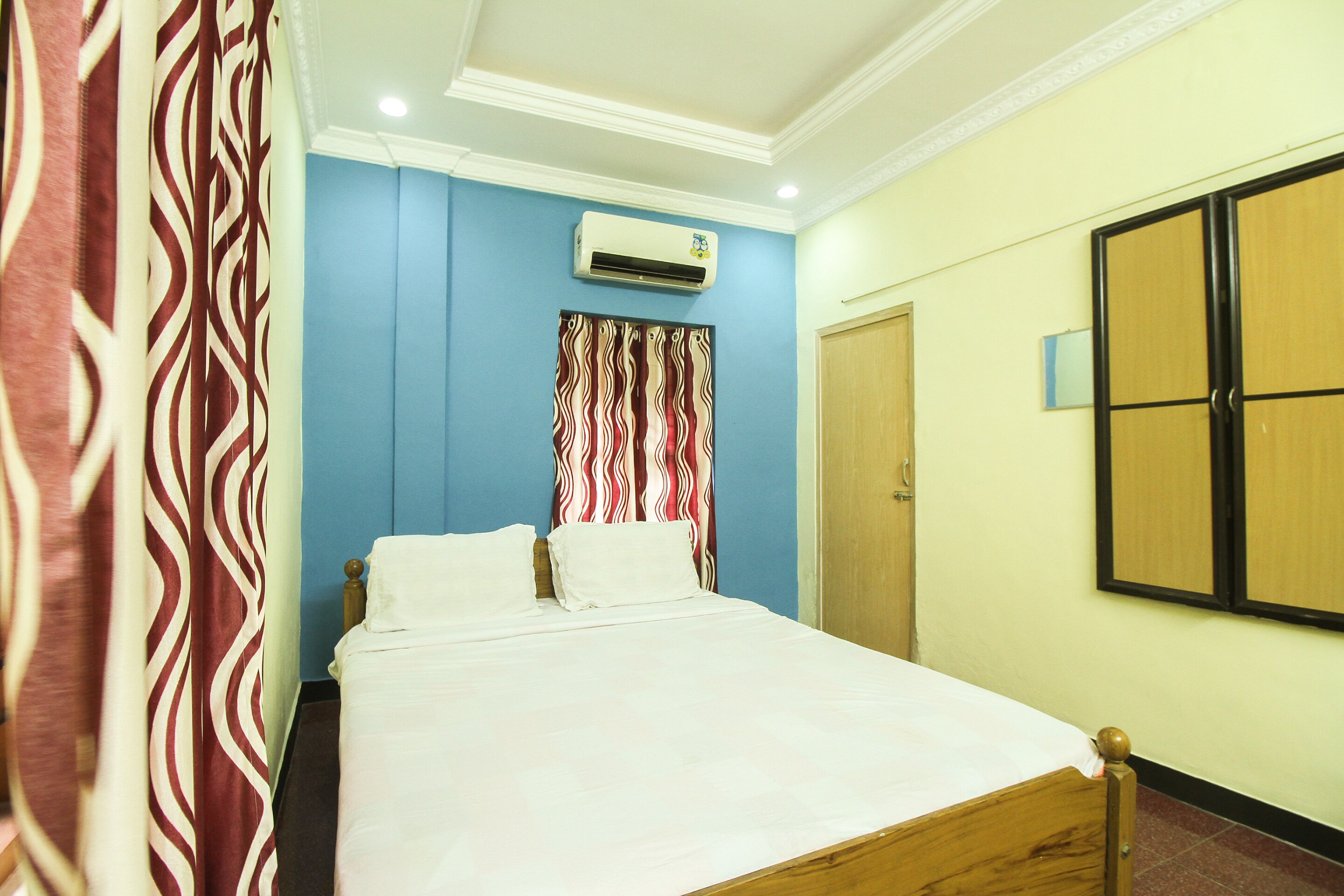 SPOT ON Mukkam Tourist Home - Tap to explore photos