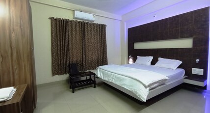 SHUBHODAYA LODGE Room Type - Deluxe Room AC