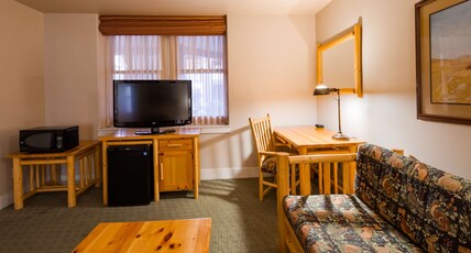 Best Western Plus Plaza Hotel Room Type - Suite-1 King Bed, Non-Smoking, Wi-Fi, Sofabed, Microwave And Refrigerator, Two Televisions, First Fl Best Western Plus Plaza Hotel Room Type - Suite-1 King Bed, Non-Smoking, Wi-Fi, Sofabed, Microwave And Refrigerator, Two Televisions, First Fl