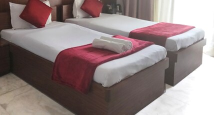 Tatvam Residency Room Type - Twin Bed Room with Balcony