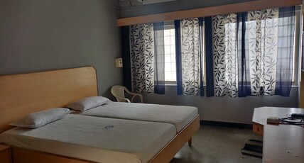 VEDHA LODGE PRIVATE LIMITED Room Type - AC double bedroom