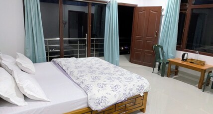 Naku homes dirang Room Type - Deluxe Room With Balcony