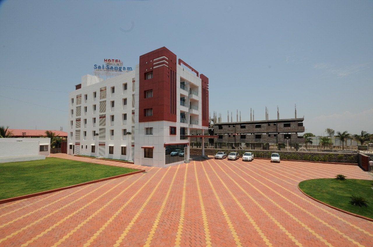 Hotel Sai Sangam - Tap to explore photos
