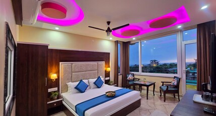 Hotel Amoda -Hotel Near Cricket Stadium Room Type - Super Deluxe Room with Balcony