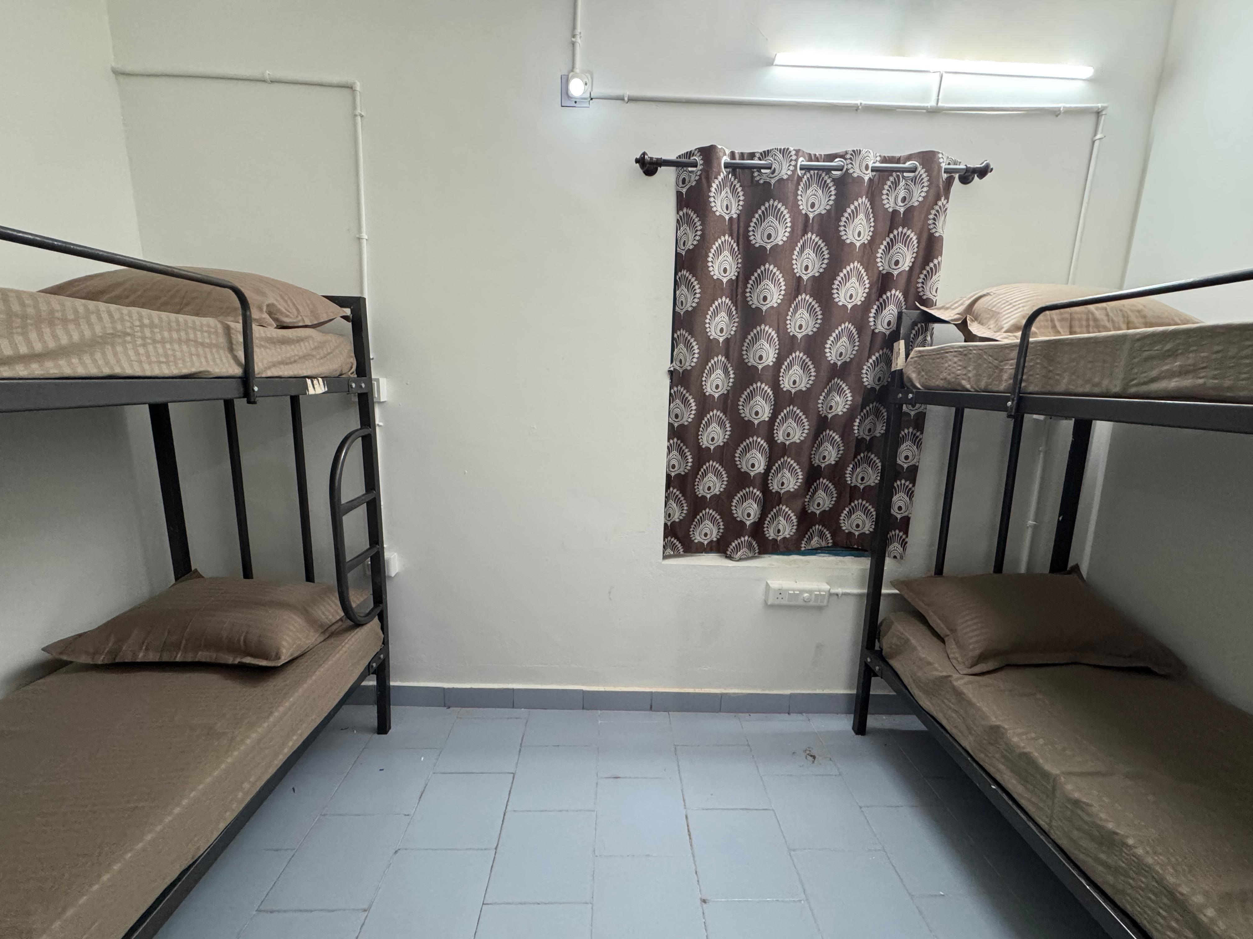 Udupi Shri Krishna Dormitory Bed Space - Tap to explore photos