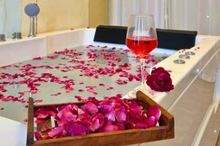 Jacuzzi 1BHK Suite By Cayetana | Near Railway St.