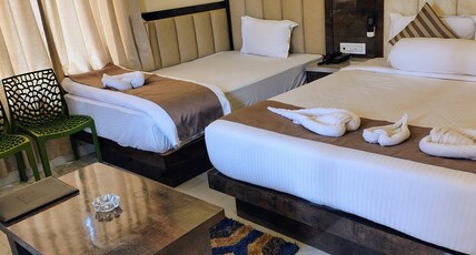 Elite Beach Resort Room Type - 3 Bed Deluxe Room with Private Balcony