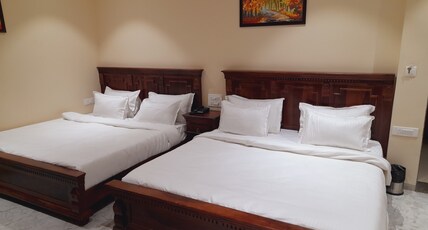 Shree Sawaibhoj Hotel and resort Room Type - Deluxe Triple Room