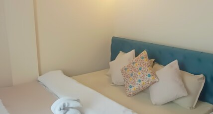 Maithili Divine Stay Room Type - Bedroom 110 Triple Bed suit 