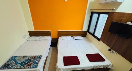 Hotel Malhar Inn Room Type - AC Family Room