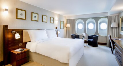 Queen Elizabeth 2 Room Type - legacy room with one king size bed