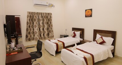 Iris Comfort Inn Room Type - Deluxe Twin Room