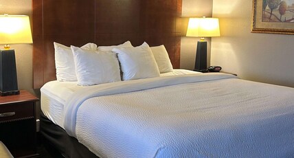 Best Western Plus Kelly Inn Room Type - Suite-1 King Bed, Non-Smoking, River View, Board Table For Six, Sofabed, Microwave And Refrigerator, Best Western Plus Kelly Inn Room Type - Suite-1 King Bed, Non-Smoking, River View, Board Table For Six, Sofabed, Microwave And Refrigerator,