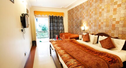 Hotel Aroma Nainital ( In house parking) Room Type - Deluxe Room