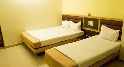 HOTEL SURYA (Pure Veg) Room Type - SUPER DELUXE ROOM ( 3 PERSON)