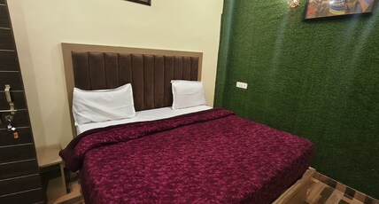 New divine inn Room Type - Bedroom 9