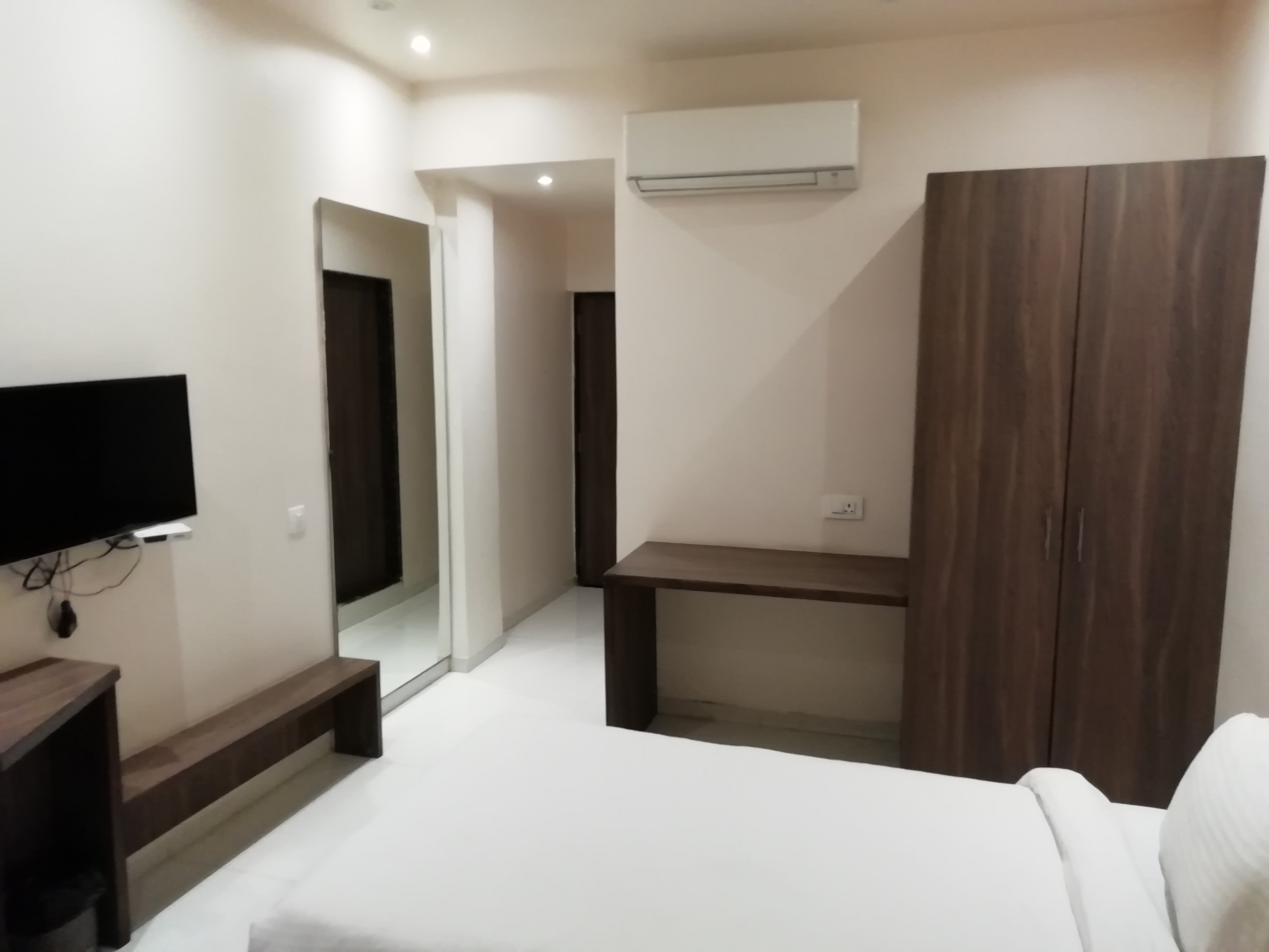 Hotel Ashish International - Tap to explore photos