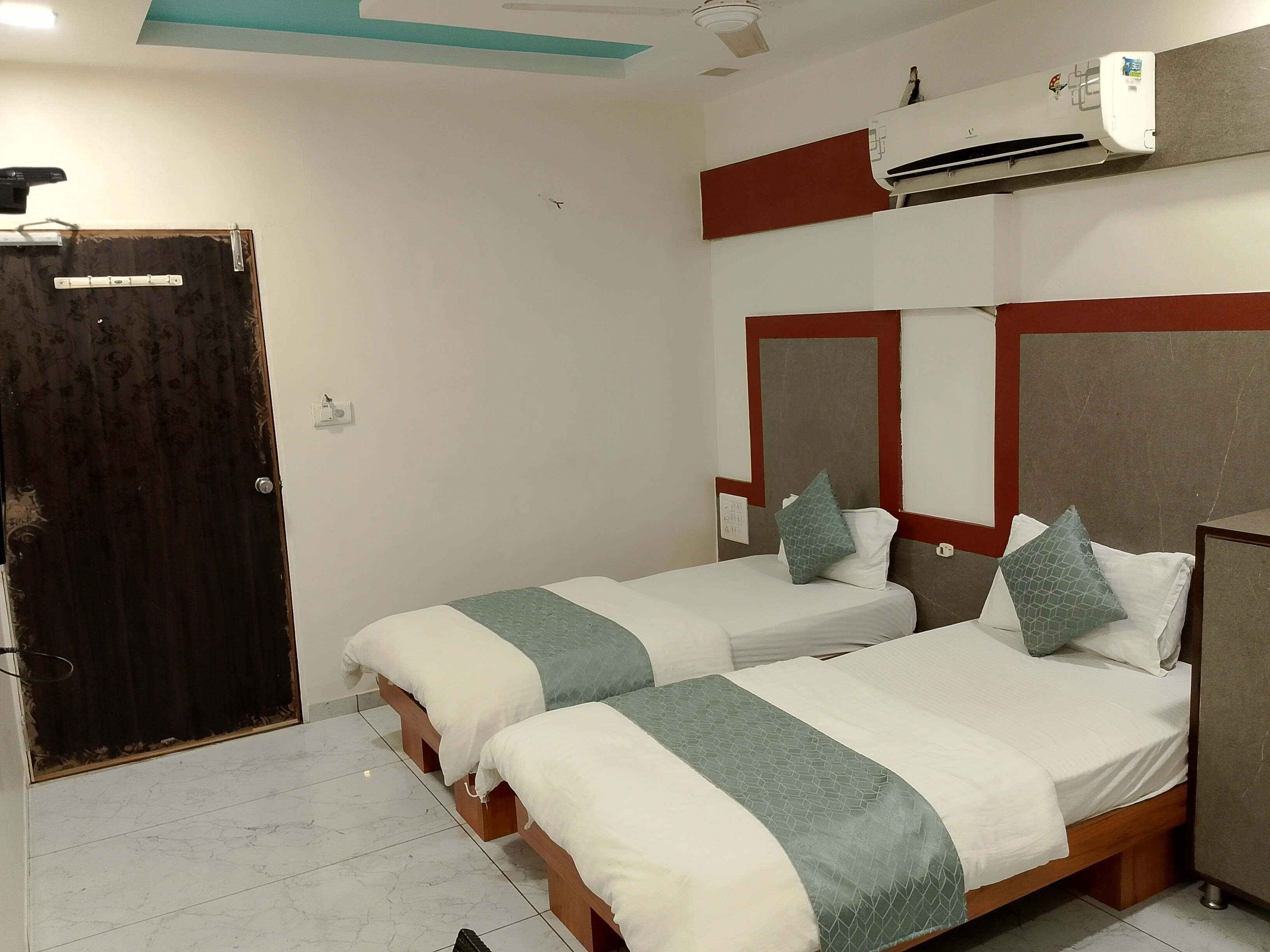 Hotel Mukund Inn SG Highway - Tap to explore photos