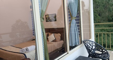 Sky Elanza Room Type - Premium Room with balcony ( Valley Breeze )