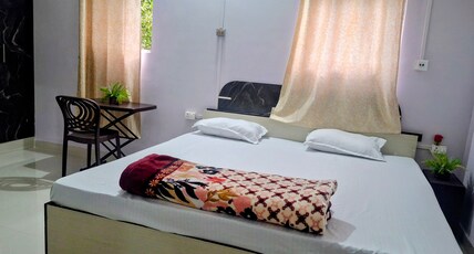 Mangaldeep Bhawan Room Type - Deluxe Room with King bed