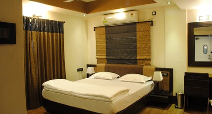 Tangerine Guest House Room Type - Deluxe AC Room with Free Wifi