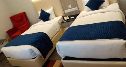 A Sheridan Inn Room Type - Deluxe - Twin Bed