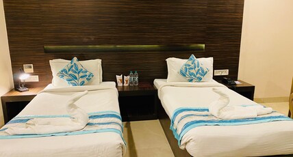 Hotel Ajay International Room Type - DELUXE TWIN BEDDED ROOM