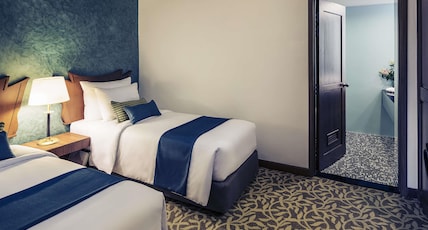 Mercure Yangon Kaba Aye Room Type - Two Bedroom King Size Bed and Two Single Beds-Living Room-Kitchenette-Balcony Mercure Yangon Kaba Aye Room Type - Two Bedroom King Size Bed and Two Single Beds-Living Room-Kitchenette-Balcony