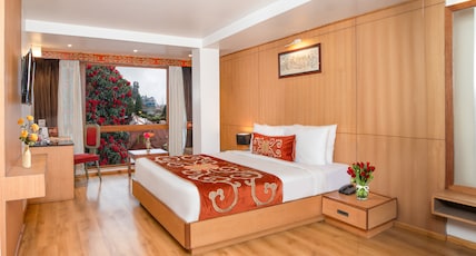 Summit Swiss Heritage Resort & Spa ( Mall Road ) Room Type - Deluxe Room with Lawn View Summit Swiss Heritage Resort & Spa ( Mall Road ) Room Type - Deluxe Room with Lawn View