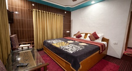 Hotel Devbhoomi (In House Parking) Room Type - Delux Double Room
