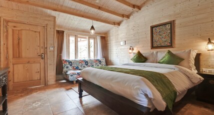 Treebo Premium Blue Mountain Resort With Swimming Pool Room Type - Deluxe Room With Garden View Treebo Premium Blue Mountain Resort With Swimming Pool Room Type - Deluxe Room With Garden View