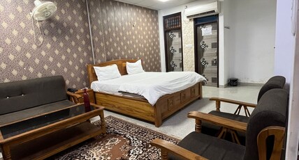 Staylo Masterprice Inn Room Type - Bedroom