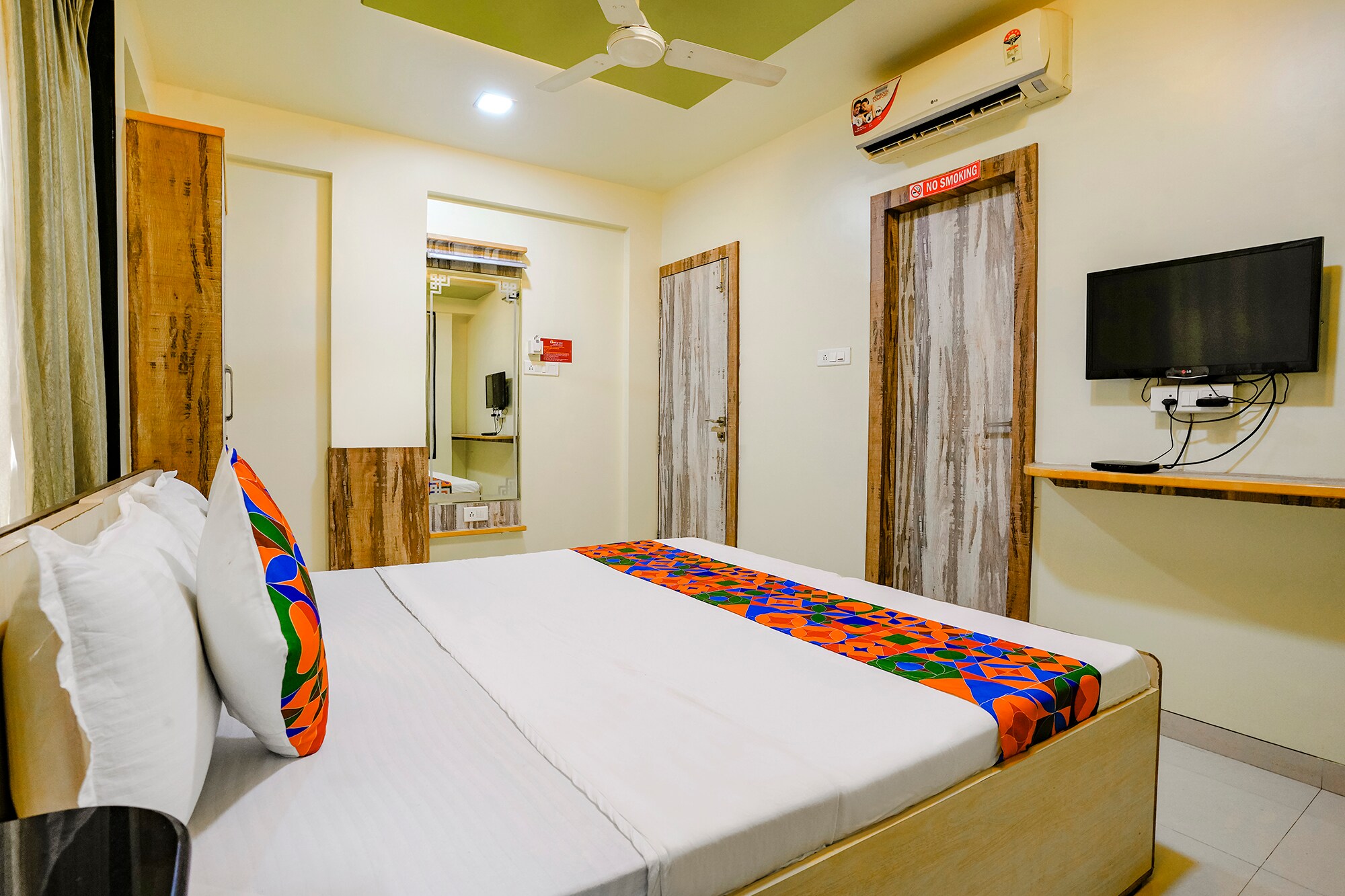 FabHotel Happy Homely Stay - Airport Road - Tap to explore photos