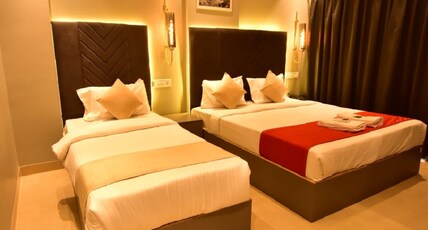 Hotel Dhanvantari Room Type - Suite room (1 double King size bed with 1 Single Bed)