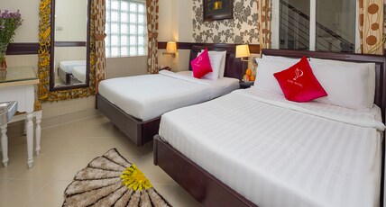 Pink Suite Saigon Airport Hotel Room Type - Premier Deluxe Triple Window With Free Minibar Pink Suite Saigon Airport Hotel Room Type - Premier Deluxe Triple Window With Free Minibar