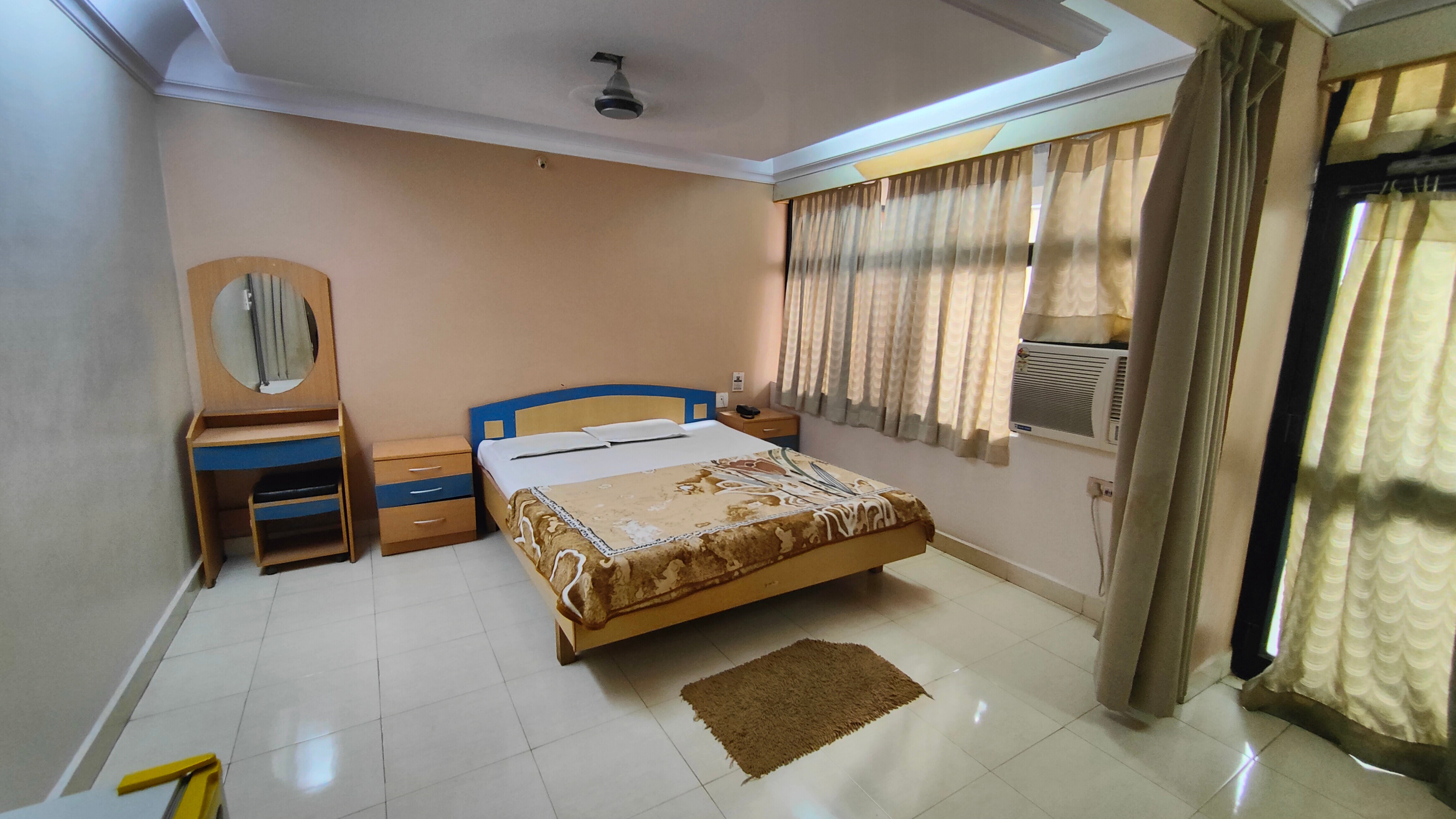 Hotel Rajdev - Tap to explore photos