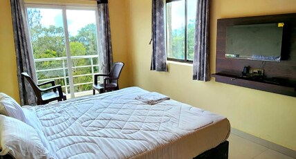 Coffee valley resort Room Type - Large Deluxe room with Balcony view