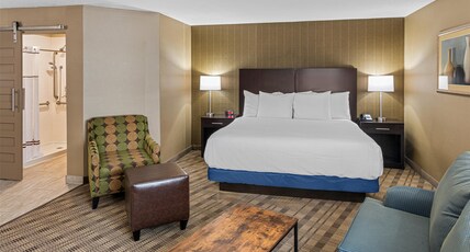 Best Western Airport Inn Room Type - Accessible - Suite King Bed, Mobility Accessible, Roll In Shower, Sofabed, Work Desk, Microwave And Best Western Airport Inn Room Type - Accessible - Suite King Bed, Mobility Accessible, Roll In Shower, Sofabed, Work Desk, Microwave And