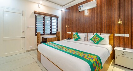 Treebo Thoduvas Star Plaza Cochin Airport Room Type - Deluxe Family Room