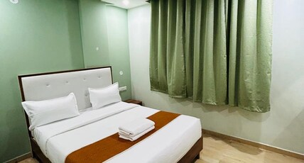 Raasaa Grand Rooms Room Type - Deluxe Triple Non-AC Room