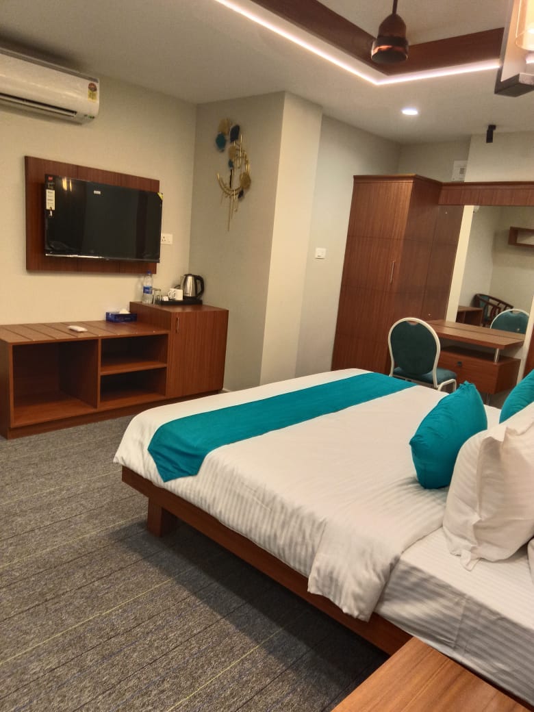Nexstay Bloomax Residency - Tap to explore photos