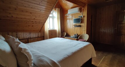 Grey Stone Hotel kalimpong Room Type - Luxury wooden Attic